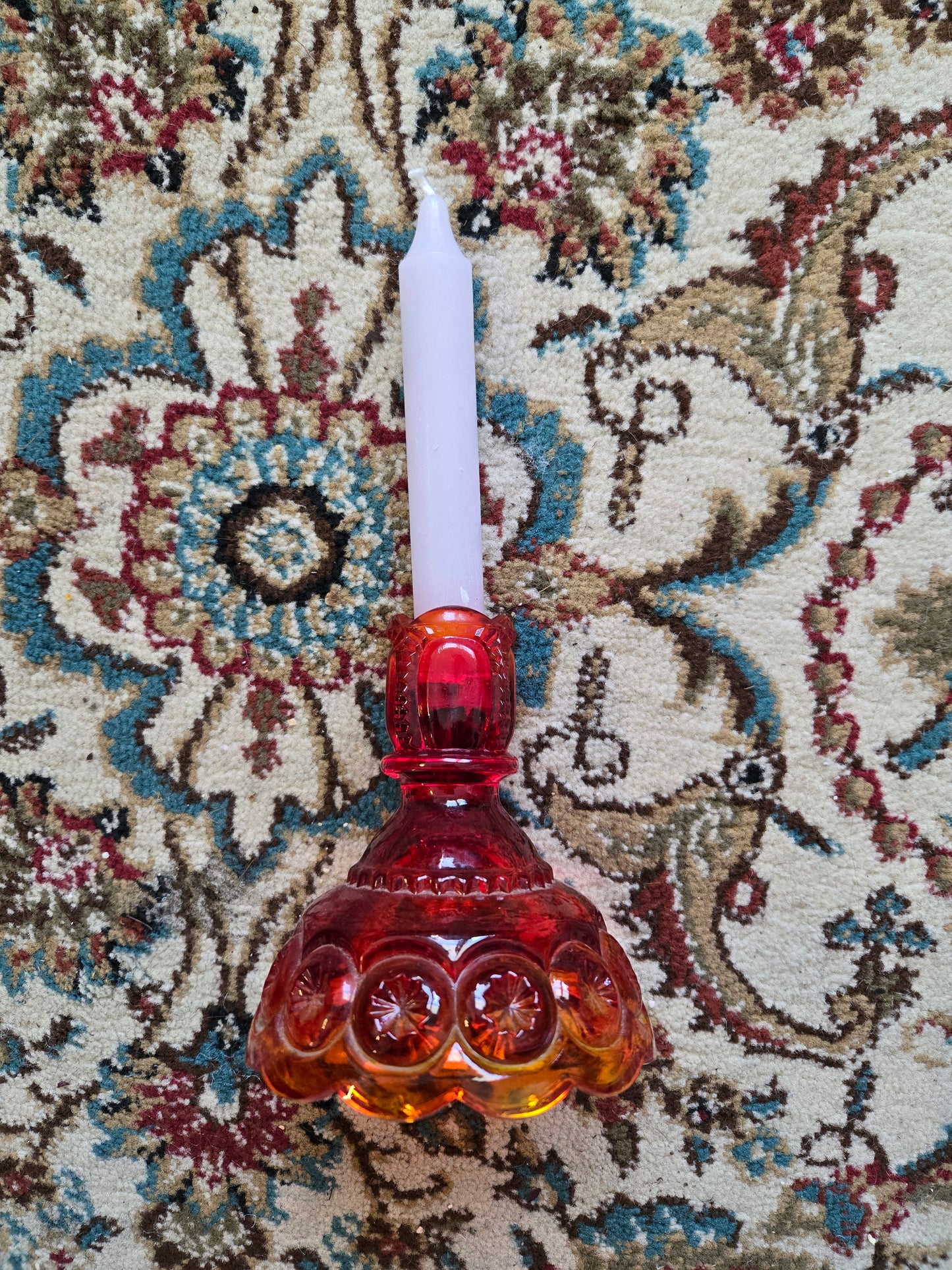 L.E. Smith Moon and Stars Amberina glass taper candle holder from the 1960s