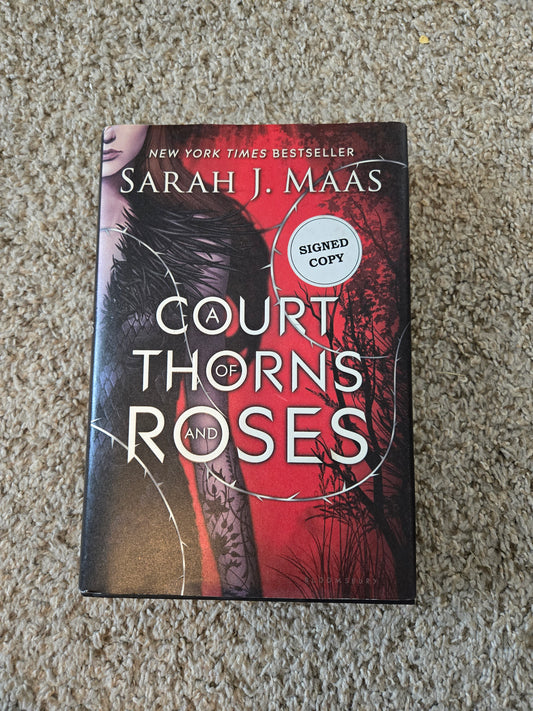 Hand Signed A Court of Thornes and Roses by Sarah J Maas