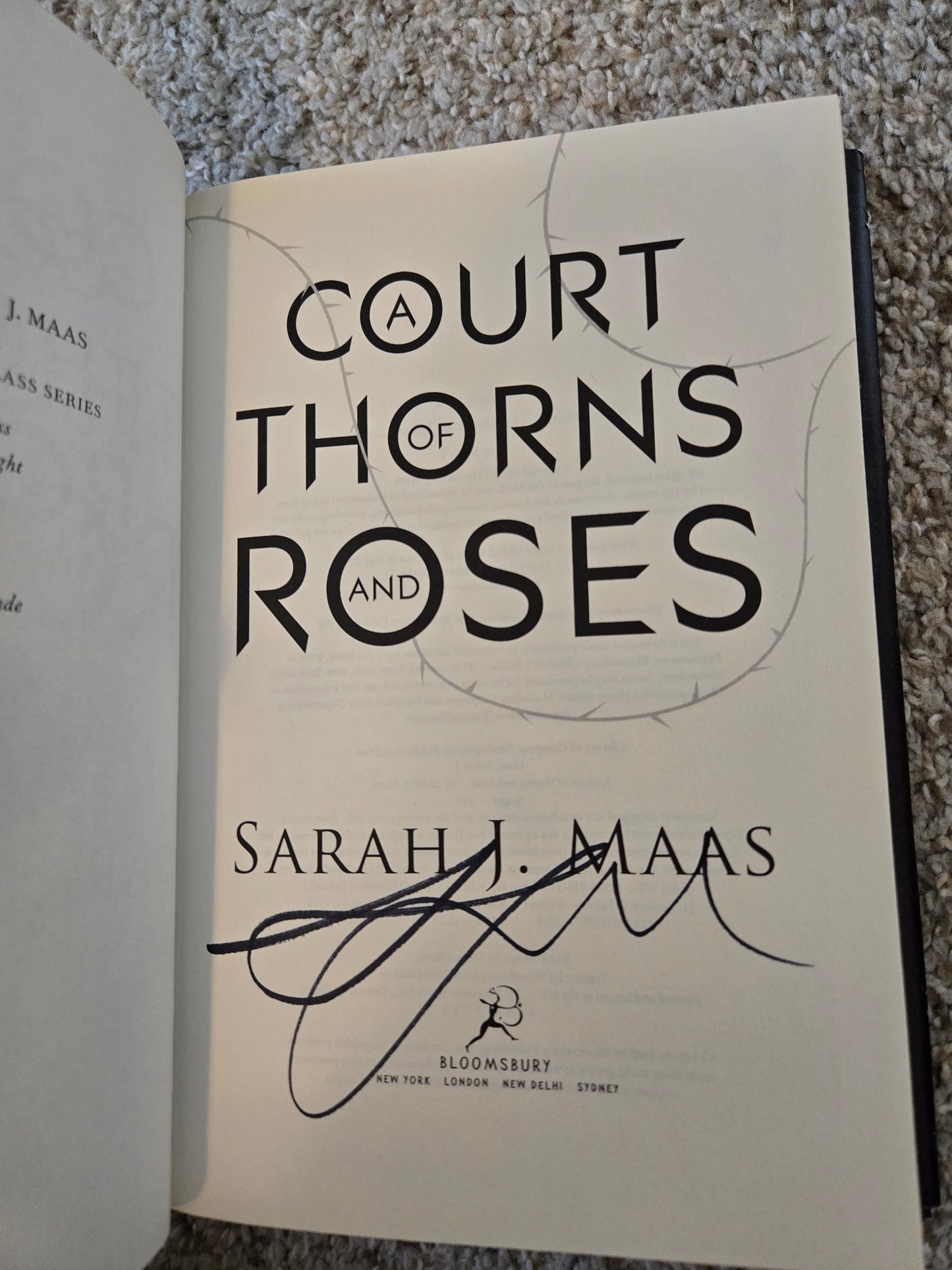 Hand Signed A Court of Thornes and Roses by Sarah J Maas